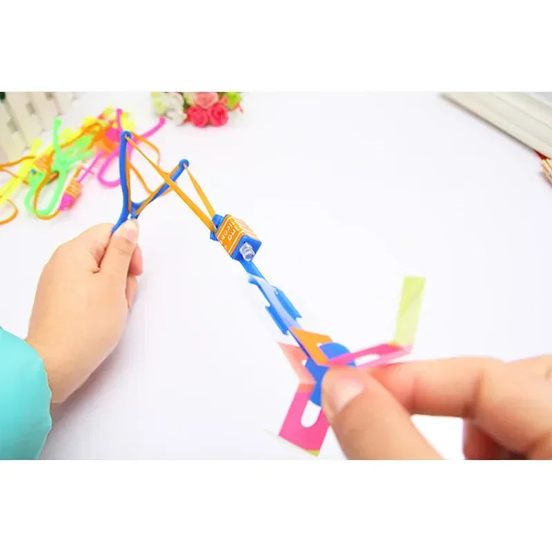 1/3/5/10/20/50/100pcs Amazing Light Toy Arrow Rocket Helicopter Flying Toy LED Light Toys Party Fun Gift Rubber Band Catapult